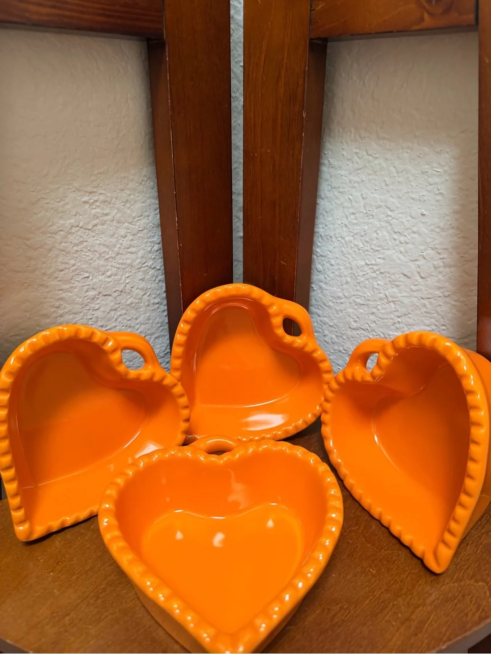 Williams-Sonoma Ceramic Heart-Shaped Dish  Set of 4 in a vibrant glossy orange.